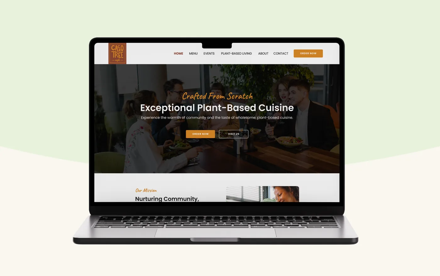 Cacao Tree Cafe website on a laptop