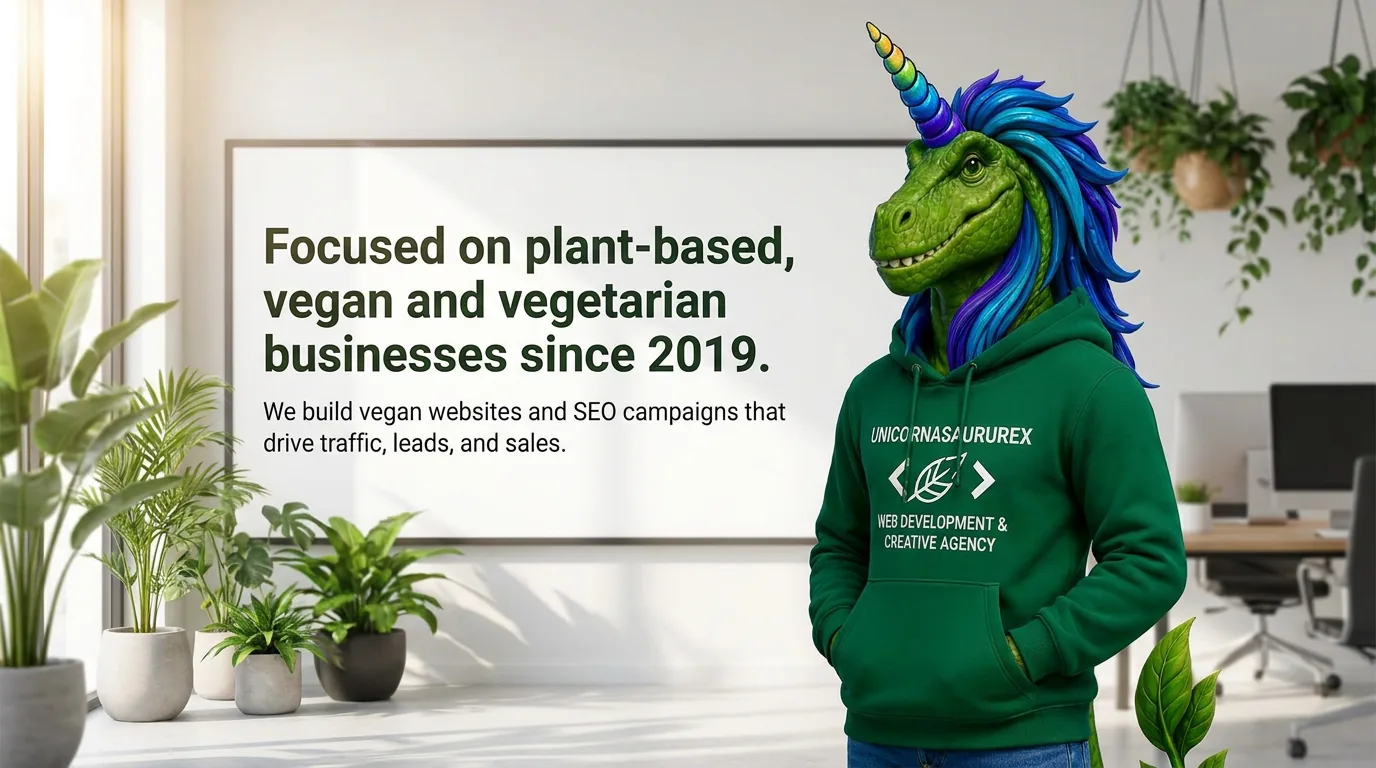 Rex beside a board about serving plant-based, vegan and vegetarian businesses since 2019